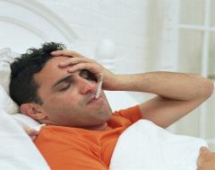 Man sick in bed